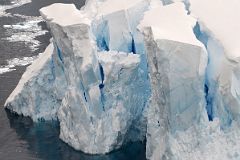 09B Huge Blocks Of Ice Close Up About To Calf From Glacier Viewpoint At Neko Harbour On Quark Expeditions Antarctica Cruise.jpg